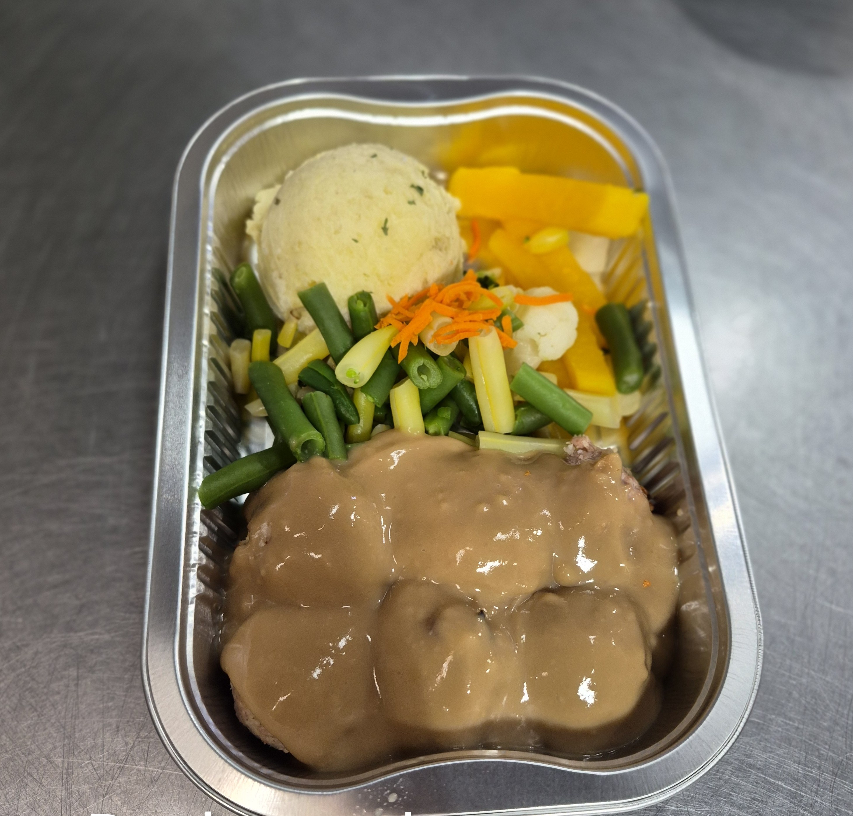 Boulettes de porc sauce à l'érableLégumes + riz